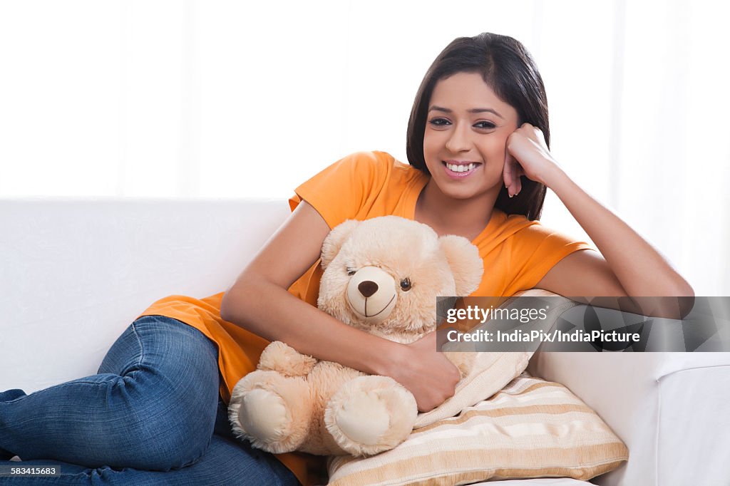 Portrait of girl with teddy bear
