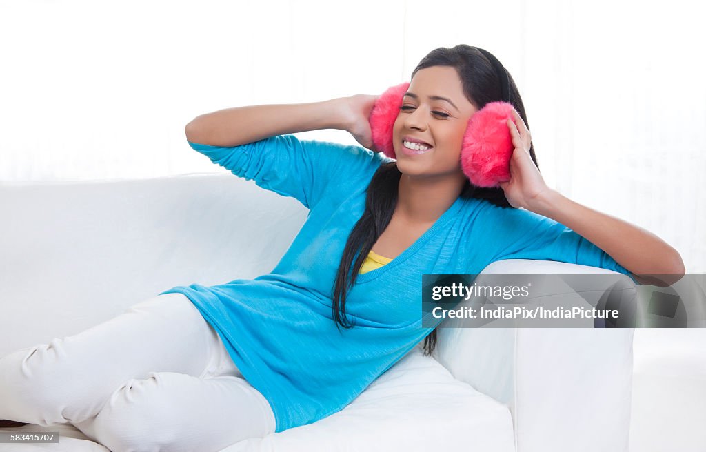 Girl with ear muffs