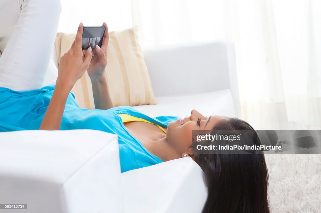 Girl looking at picture on mobile phone