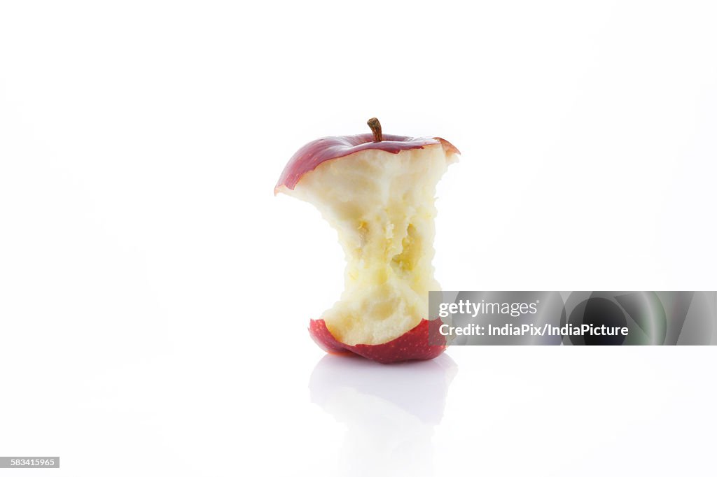Close-up of eaten red apple