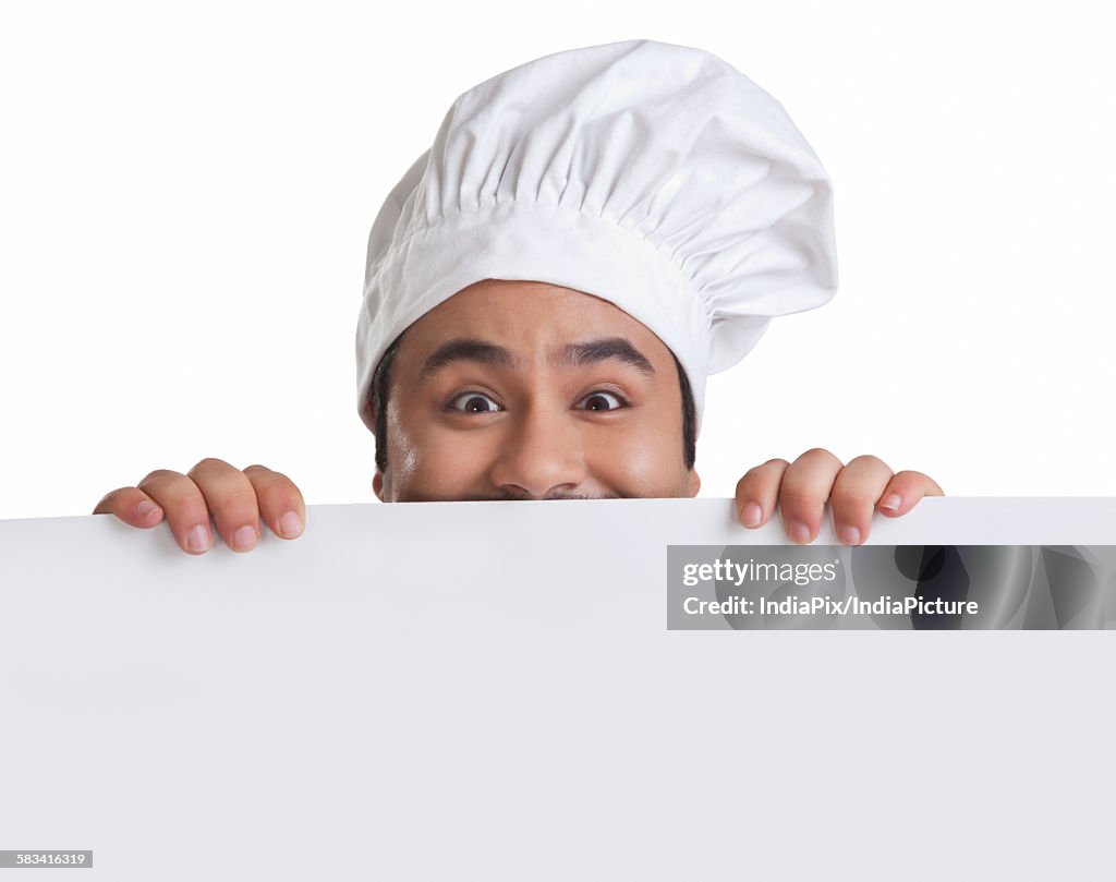 Portrait of chef hiding