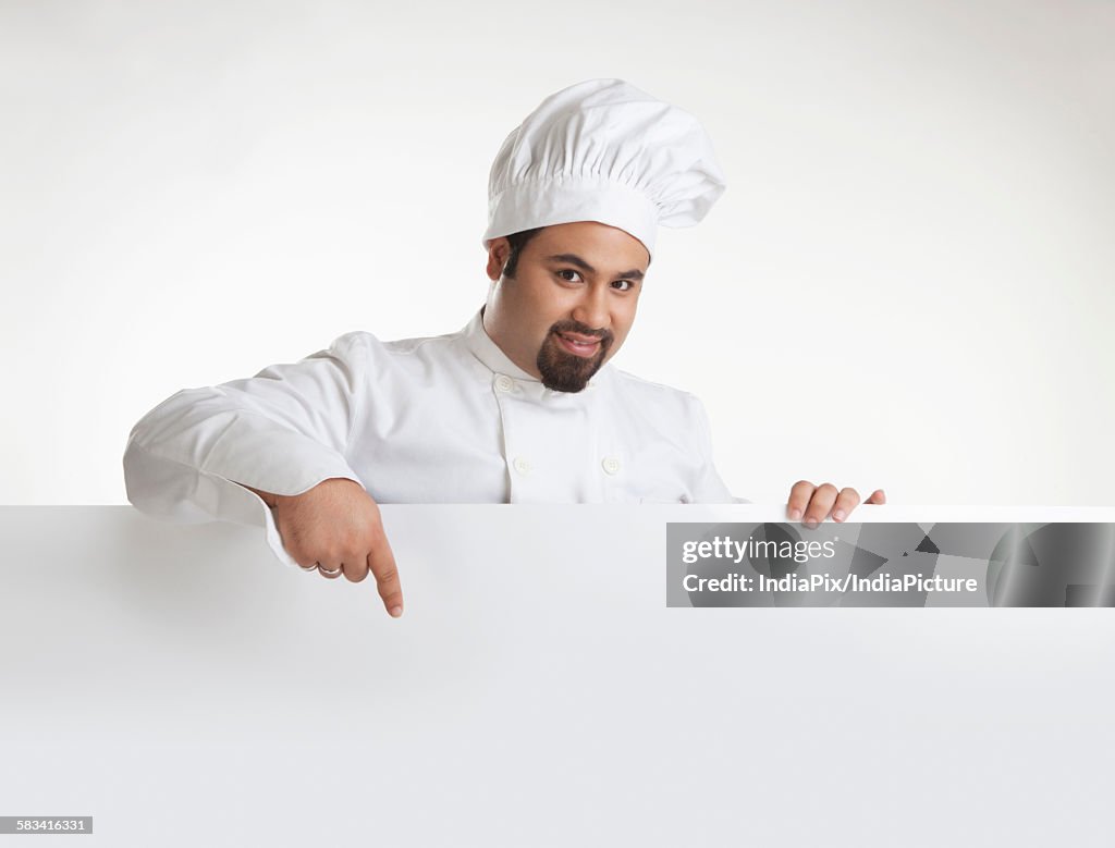 Portrait of chef pointing