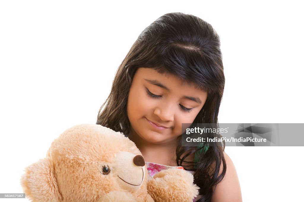 Girl with teddy bear