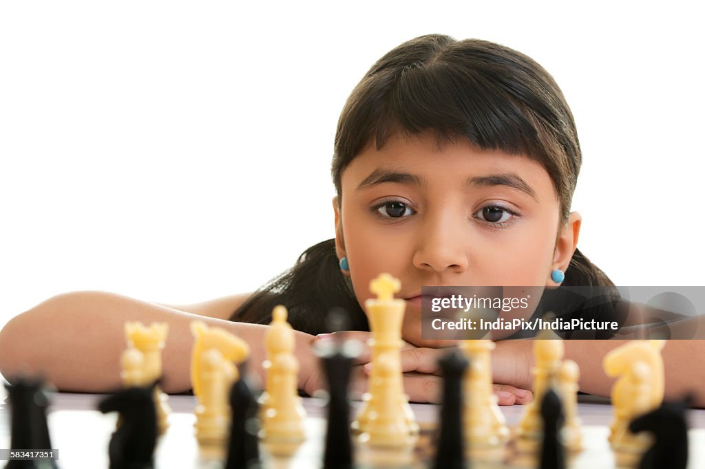 Girl playing chess