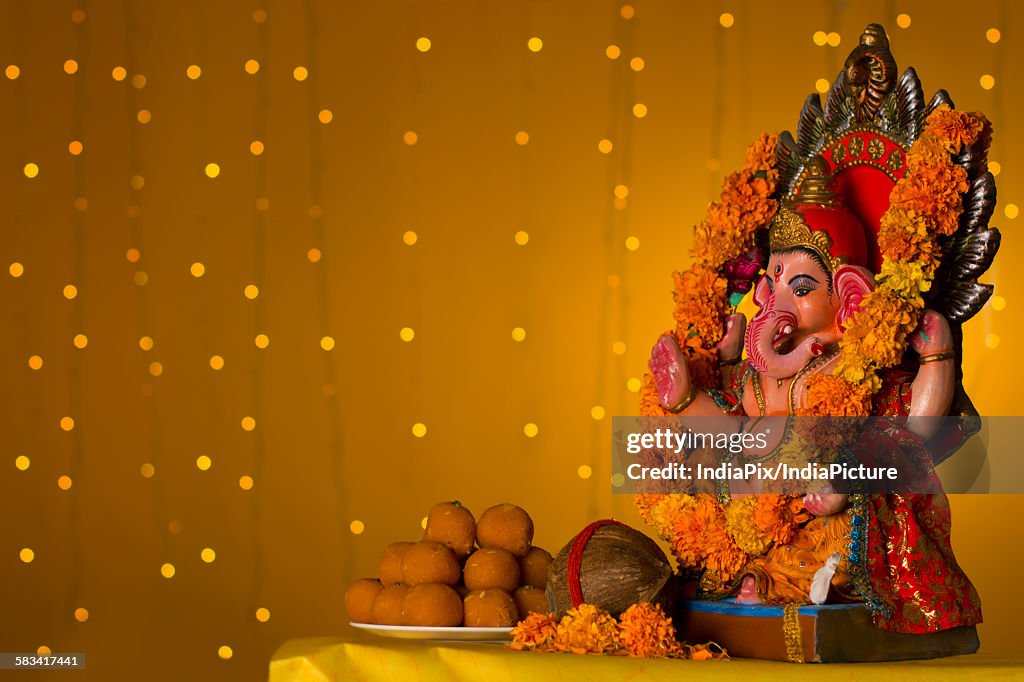 Ganesh idol and laddus