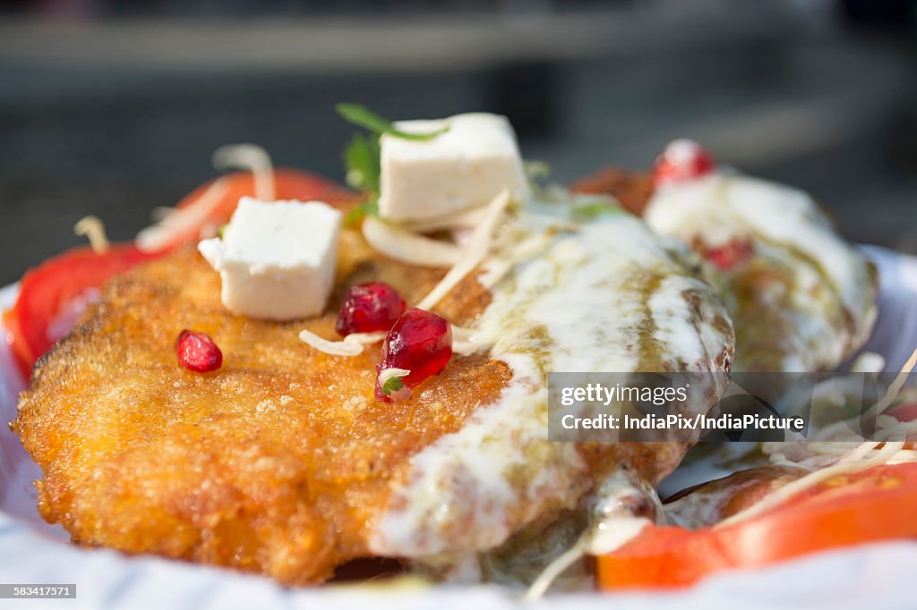 Cutlet with sauce served in a plate
