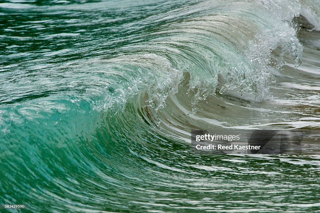 Shore break is frozen in time as it crashes on the beach