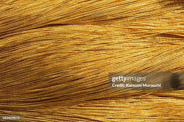 bunch of golden thread - filament stock pictures, royalty-free photos & images