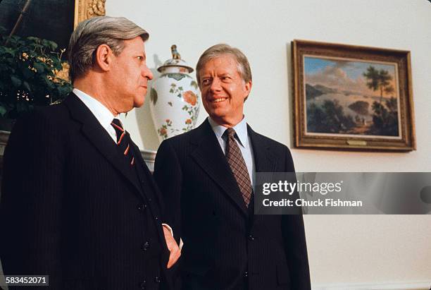 German Chancellor Helmut Schmidt, left, and American President Jimmy Carter, right, in the Oval Office at the White House, Washington, DC, March 1980.