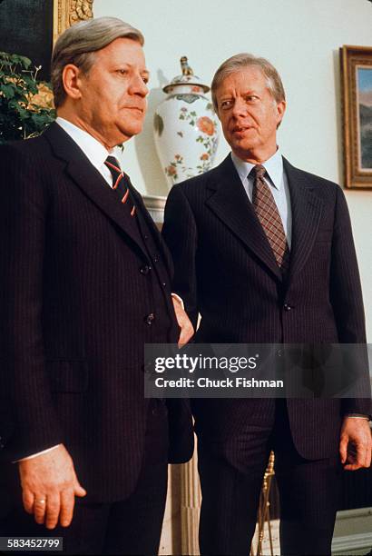 German Chancellor Helmut Schmidt, left, and American President Jimmy Carter, right, in the Oval Office at the White House, Washington, DC, March 1980.