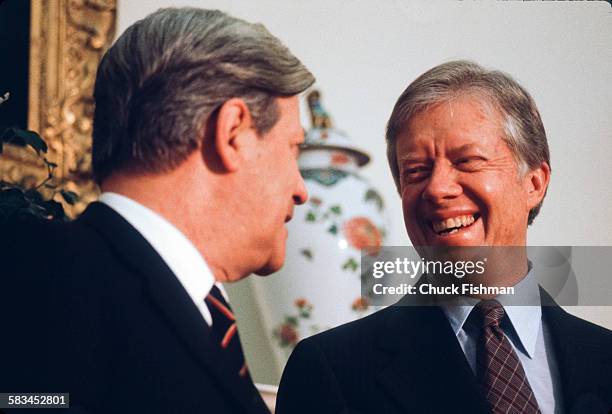 German Chancellor Helmut Schmidt, left, and American President Jimmy Carter, right, in the Oval Office at the White House, Washington, DC, March 1980.