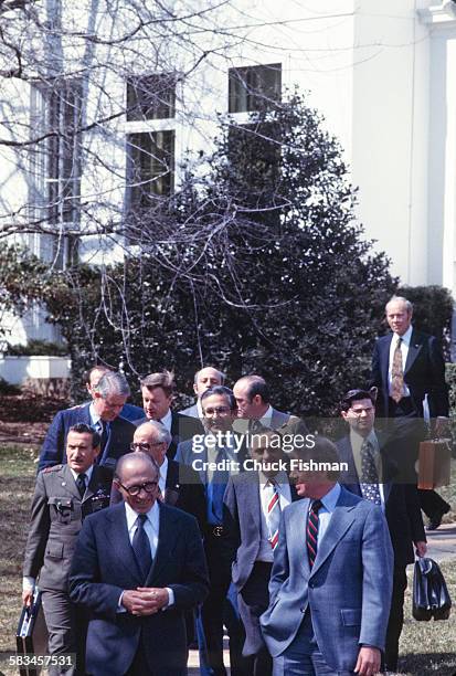 United States President Jimmy Carter, right, walks and converses with Israeli Prime Minister Menachem Begin outside the Oval Office at the White...