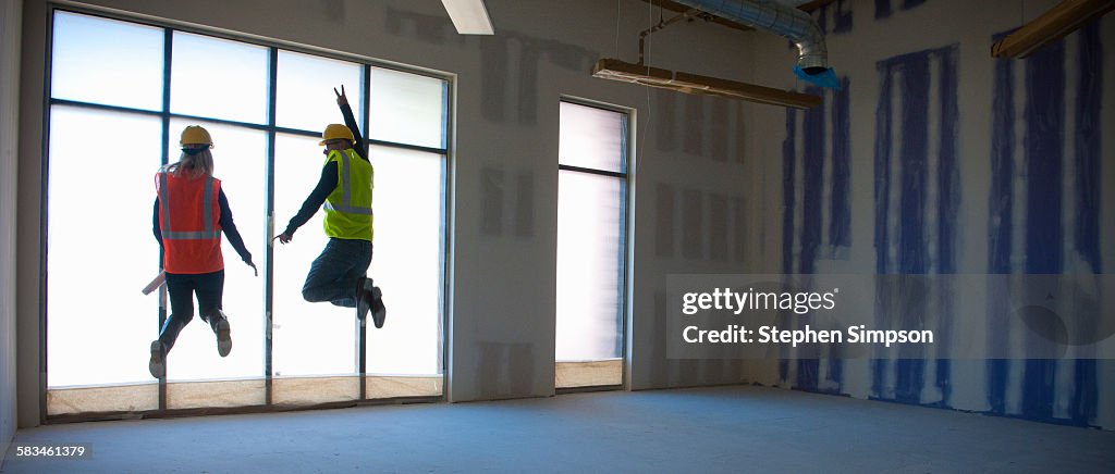 Architects/contractors on school construction site