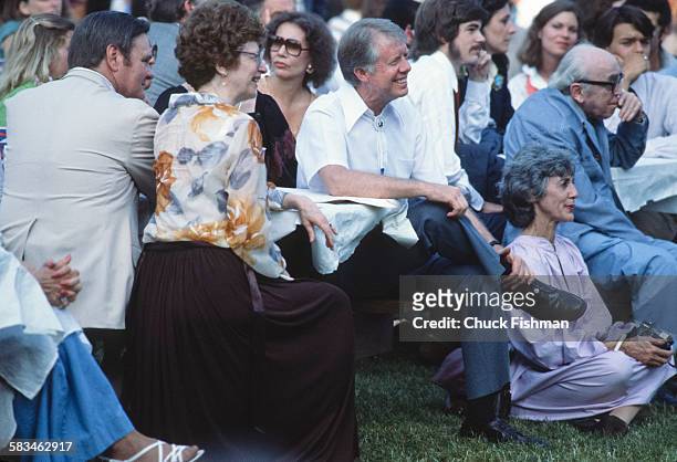 President Jimmy Carter, center, on the South Lawn of the White House during the White House Jazz Concert on the occasion of the 25th anniversary of...