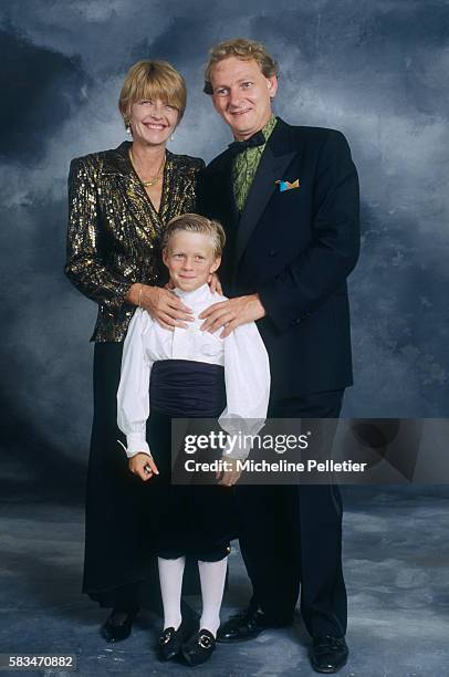 French cartoonist Claire Bretecher stands with her husband, university professor Guy Carcassonne, and their son Martin.