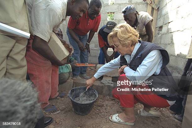 Placing the first stone of a hospital at Ziguinchor where a re-education center had been built.