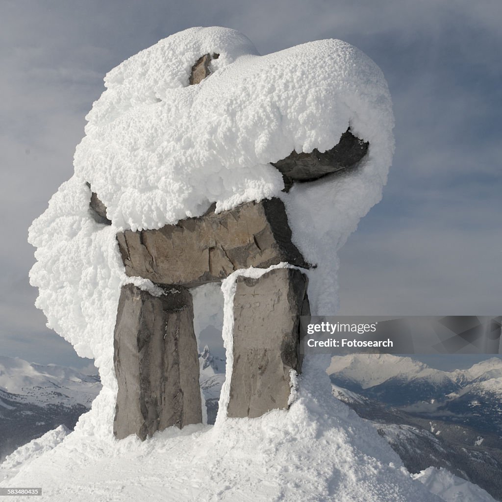 Snow covered inuksuk