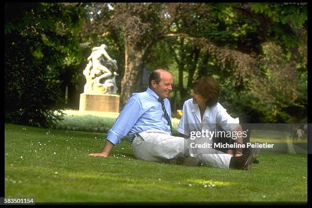 JACQUES AND LISE TOUBON IN A PARIS GARDEN