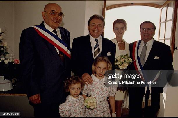 French TV presenter Jacques Martin during the wedding ceremony to his new wife, Celine-Marie. Present at the ceremony are Martin's children from a...