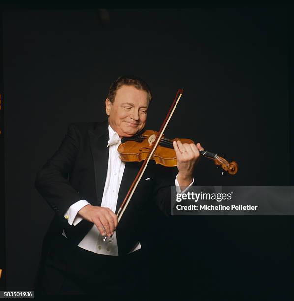 French television presenter Jacques Martin plays viola.