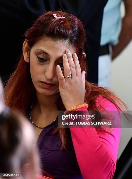 Mohamed's mother, Aldiana Januzi attends a verdict hearing in the trial of Silvio S, a German security guard accused of murdering two children, one...