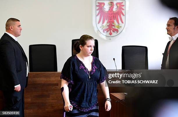 Elias's mother, Anita S, attends a verdict hearing in the trial of Silvio S, a German security guard accused of murdering two children, one of them a...