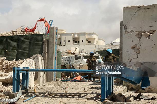 African Union Mission in Somalia soldiers take security measurements after a bomb attack with bomb-laden vehicles over the United Nations, African...