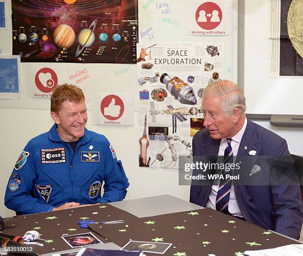 Prince Charles, Prince of Wales meets British astronaut Tim Peake during a visit to his Prince's Trust centre where the charity's beneficiaries,...