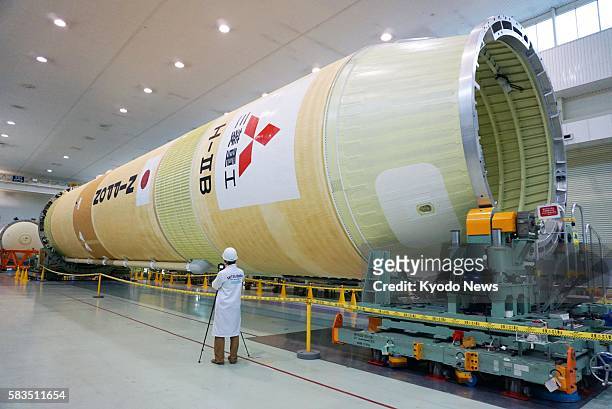 Mitsubishi Heavy Industries Ltd. Unveils the first stage of an H-2B rocket, which will be launched from the Tanegashima Space Center in Kagoshima...