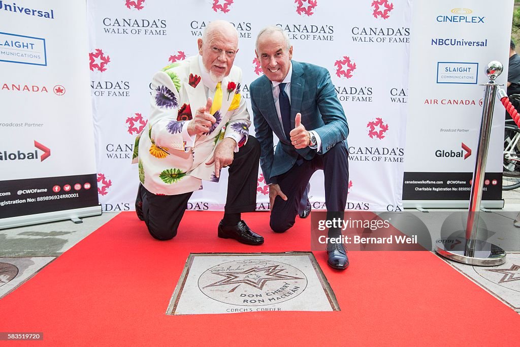 Sportscasters Don Cherry and Ron MacLean unveiled their stars