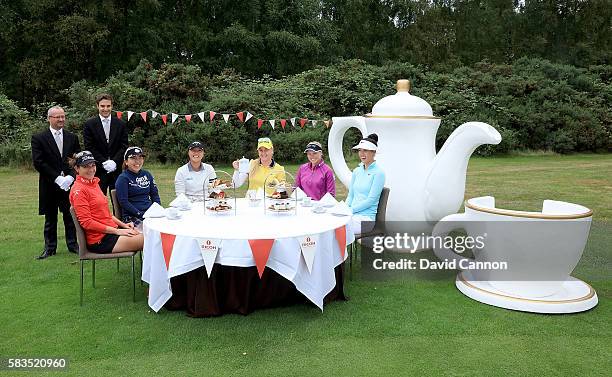 Charley Hull of England hosts a traditional English tea party for her fellow golfers at a photocall held at her home club, Woburn GC, Brittany Lang...