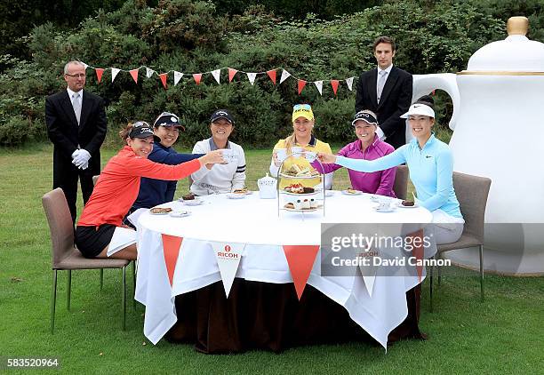 Charley Hull of England hosts a traditional English tea party for her fellow golfers at a photocall held at her home club, Woburn GC, Brittany Lang...