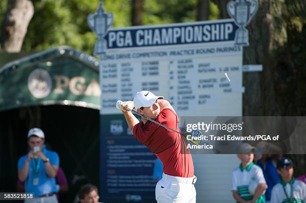 Rory McIlory of Northern Ireland hits his tee shot on the first hole during the Long Drive Competition for the 98th PGA Championship held at the...