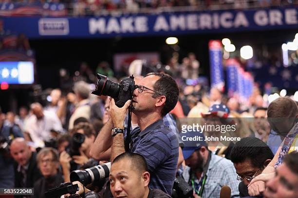Getty Images photojournalist Chip Somodevilla photographs as Republican presidential candidate Donald Trump speaks on the fourth day of the...