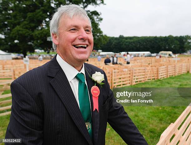 Chris Leckenby, President of the Ryedale Show reacts as he chats to farmers at the 150th Ryedale Agricultural Show on July 26, 2016 in...