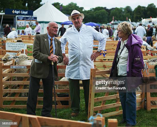 Steward chats to sheep owners at the 150th Ryedale Agricultural Show on July 26, 2016 in Kirkbymoorside, England. The Ryedale Show was established in...