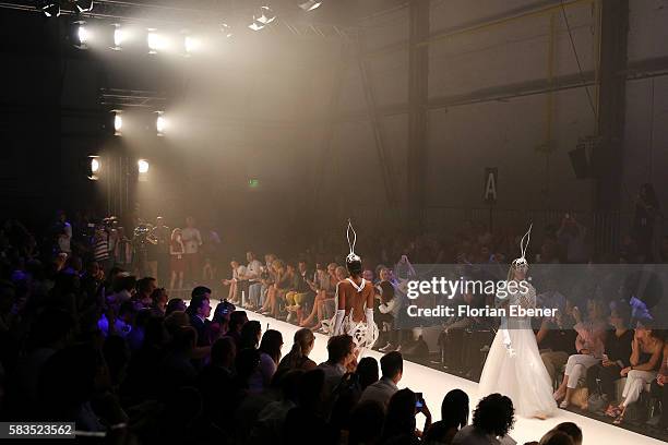 Models walk the runway at the 3D Fashion Presented By Lexus show during Platform Fashion July 2016 at Areal Boehler on July 23, 2016 in Duesseldorf,...