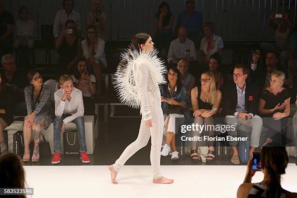 Model walks the runway at the 3D Fashion Presented By Lexus show during Platform Fashion July 2016 at Areal Boehler on July 23, 2016 in Duesseldorf,...