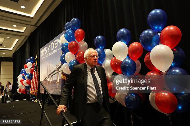 Senator Bernie Sanders exits the stage after addressing the New York delegation at the Democratic National Convention on July 26, 2016 in...