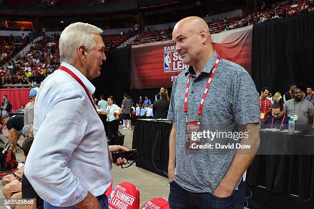 Jerry West of the Golden State Warriors and Danny Ferry of the Atlanta Hawks have a conversation during the 2016 NBA Las Vegas Summer League on July...