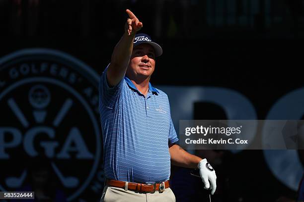 Jason Dufner of the United States reacts on the first hole during a practice round prior to the 2016 PGA Championship at Baltusrol Golf Club on July...
