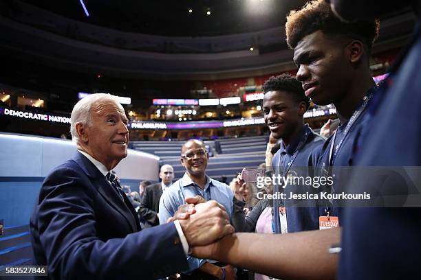 Vice President Joe Biden talks to students from Eagle Academy for Young Men during a walk through before day two of the Democratic National...