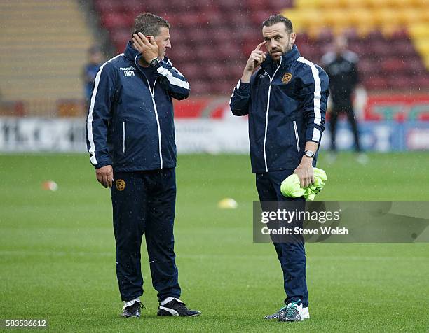 Mark McGhee Manager of Motherwell with newly appointed assistant player manager James McFadden during the pre match warm up before the BETFRED Cup...