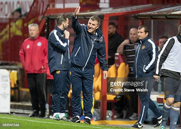 Mark McGhee Manager of Motherwell shouts out to his players during the BETFRED Cup First Round Group F Match between Motherwell and East...