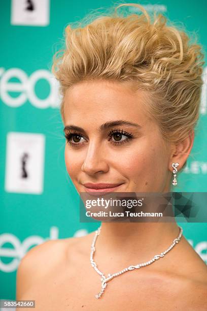 Pixie Lott arrives for the opening night of Breakfast at Tiffany at Theatre Royal on July 26, 2016 in London, England.