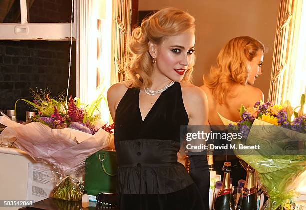 Pixie Lott poses backstage following the press night performance of "Breakfast at Tiffany's" at the Theatre Royal Haymarket on July 26, 2016 in...