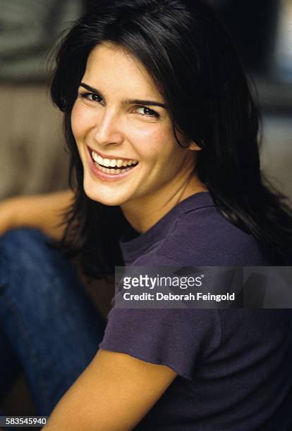 Deborah Feingold/Corbis via Getty Images) NEW YORK Actress Angie Harmon poses for a portrait in September 1998 in New York, New York.