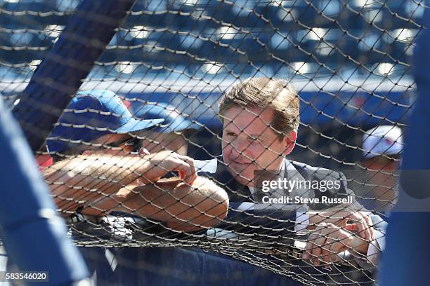 Broadcaster Matt Devlin talks with Toronto Blue Jays manager John Gibbons scrum as the Toronto Blue Jays play the San Diego Padres at the Rogers...