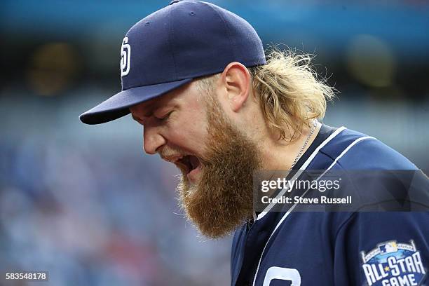 Andrew Cashner is frustrated after giving up a two run homer in the first inning as the Toronto Blue Jays play the San Diego Padres at the Rogers...