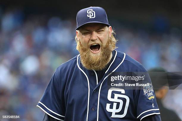 Andrew Cashner is frustrated after giving up a two run homer in the first inning as the Toronto Blue Jays play the San Diego Padres at the Rogers...